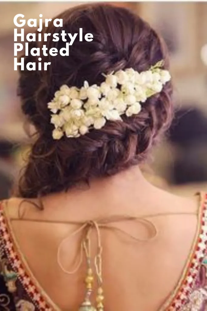What a beautiful large large low bun with real flower gajra! Care however  should be taken before adopting such hairstyles, as due to it's high static  charge, it…